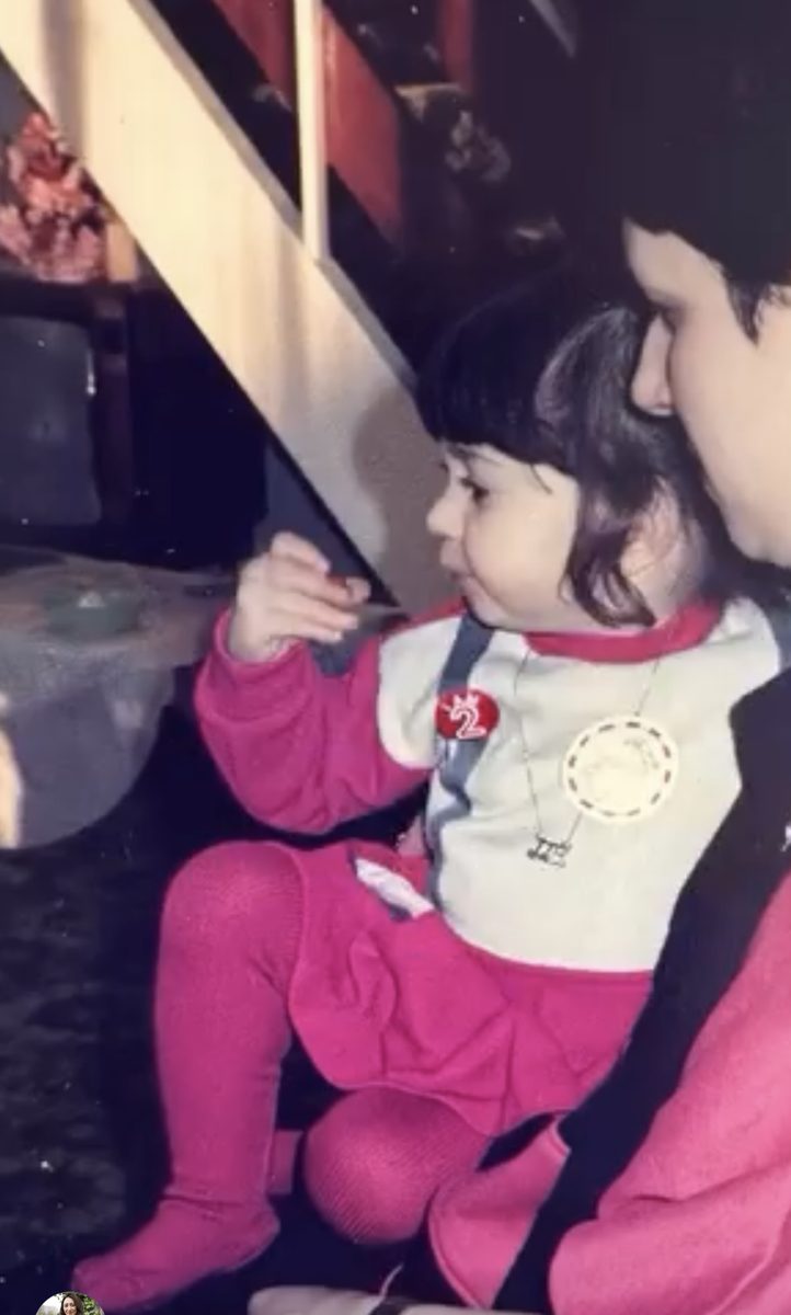 Lauren as a little girl in pink tights