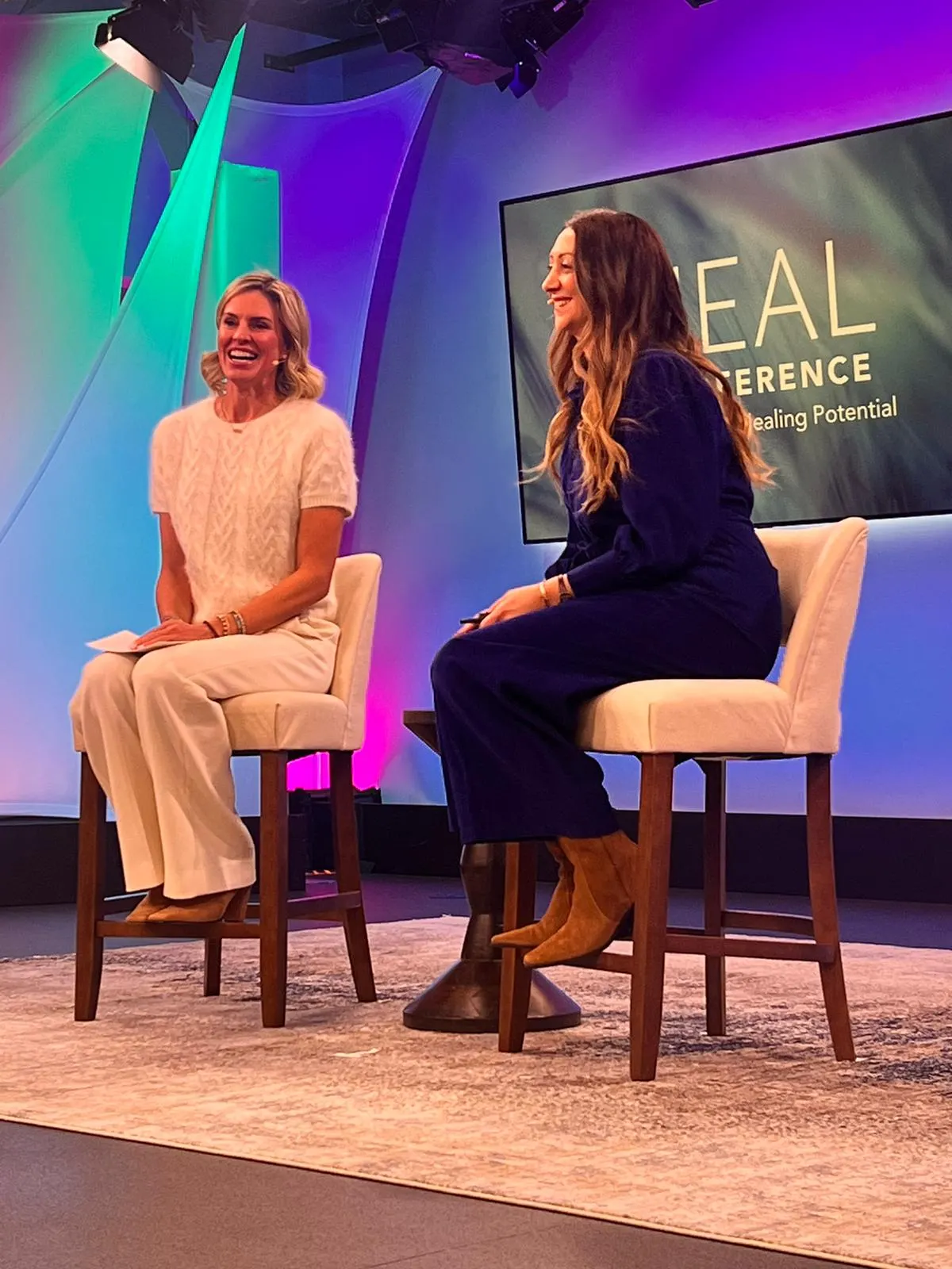Lauren Vaknine in conversation on stage at the Heal conference